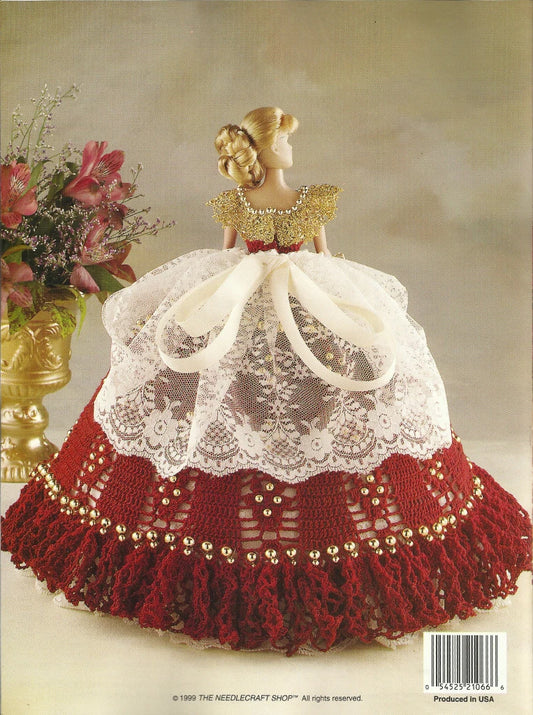 Knitted doll with a red and white dress on a beige background
