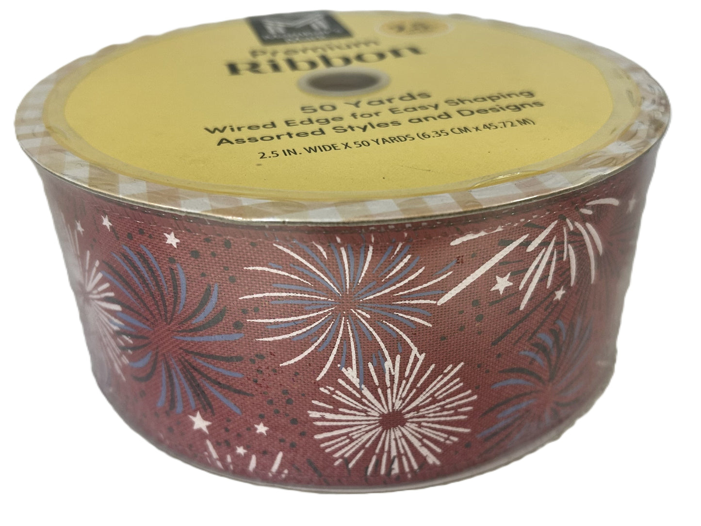 Container of ribbon with fireworks design on a white background