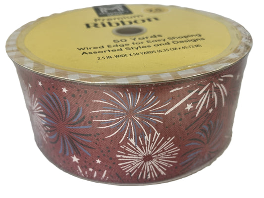 Container of ribbon with fireworks design on a white background