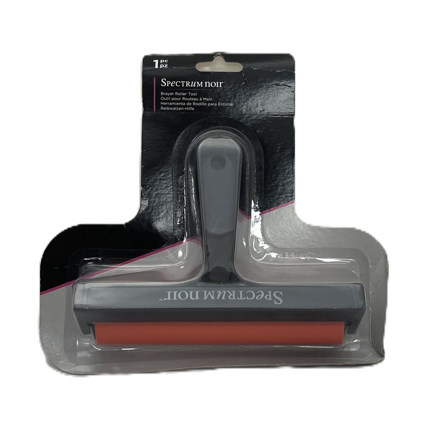 Dog grooming brush in packaging on a white background