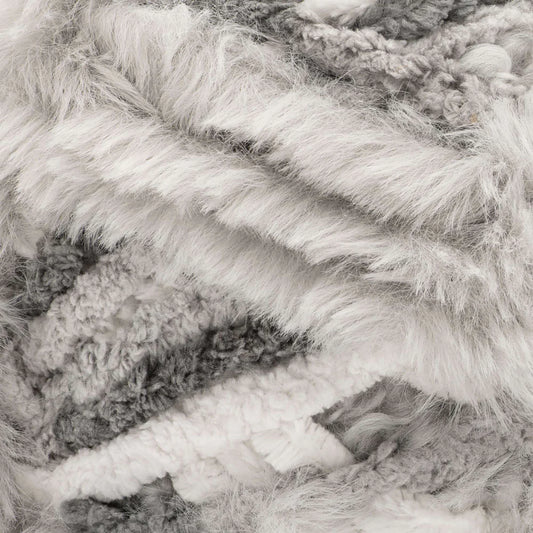 Close-up of textured yarn in gray and white tones