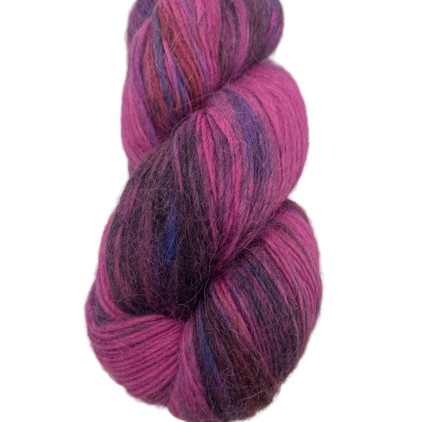 Skein of pink and purple yarn on a white background