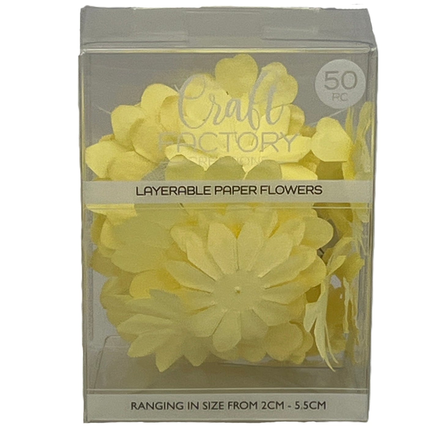 Packaged yellow layerable paper flowers with 'Craft Factory' branding.