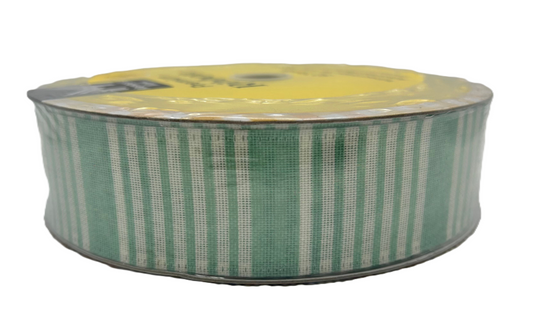 Roll of green and white striped ribbon on a white background
