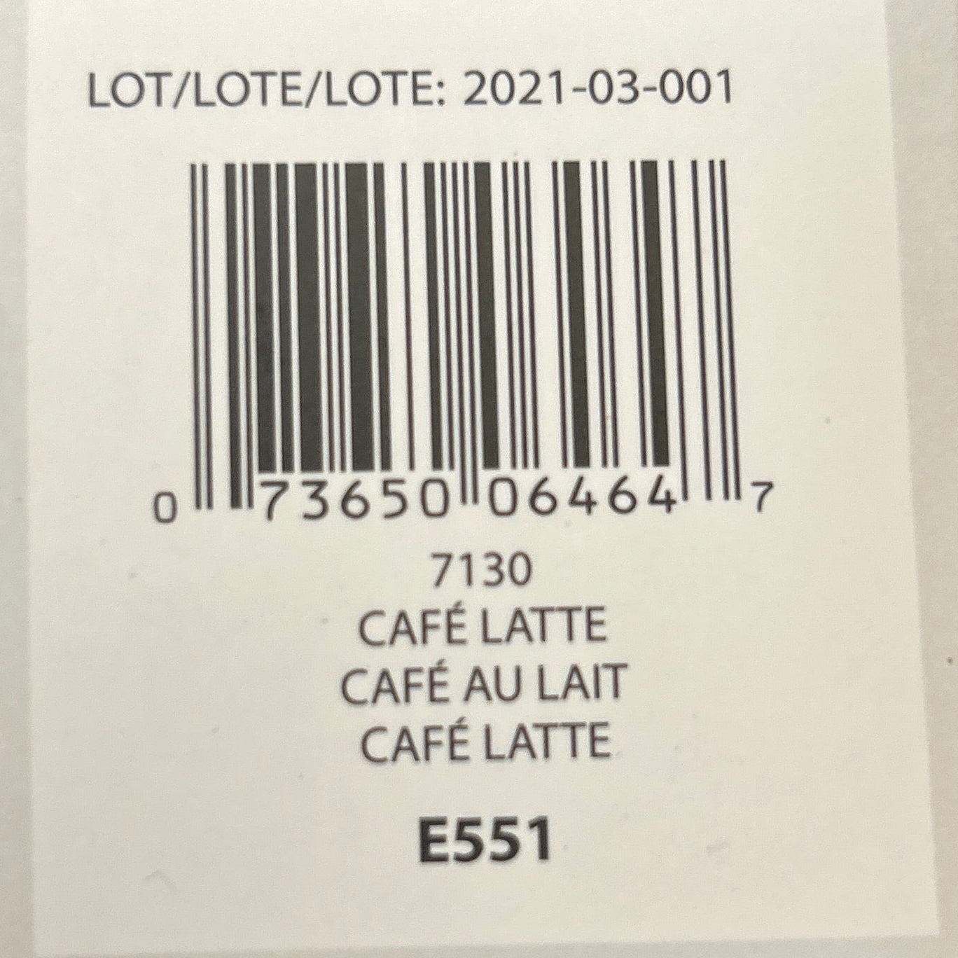 Barcode label with product details on a beige background