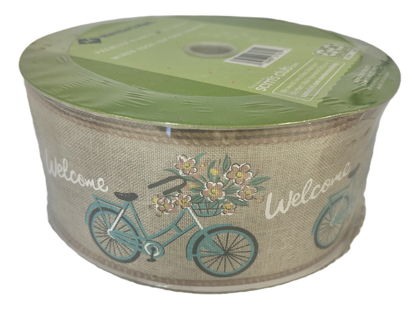 Roll of decorative ribbon with bicycle and flower design on a white background