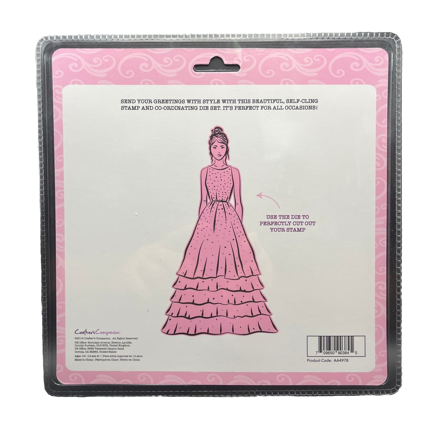 Pink dress die cut on a clear card with decorative pink border