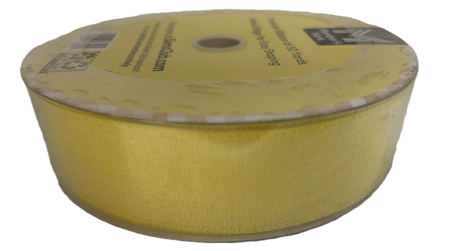 Yellow roll of fabric with a white background