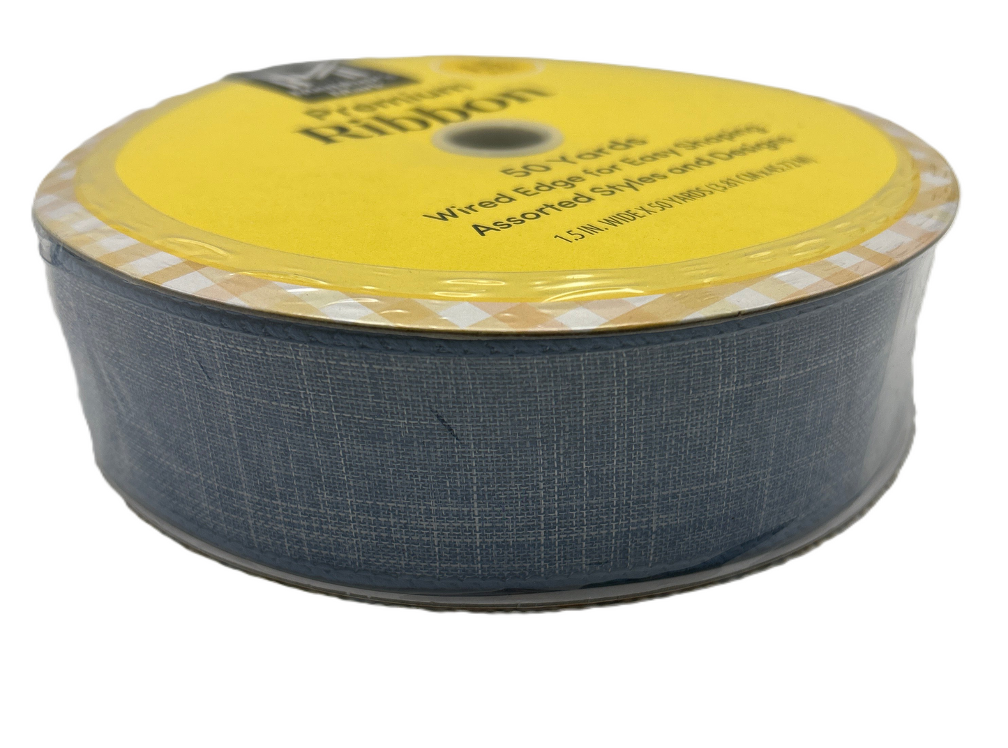 Spool of blue ribbon with yellow label on a white background