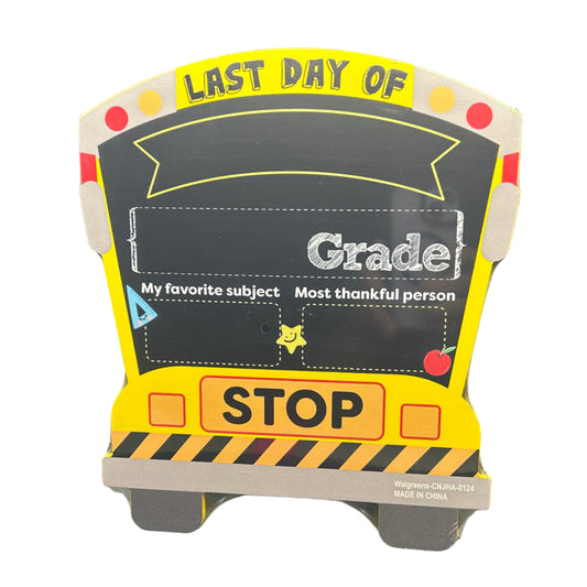 Children's stop sign with 'Last Day of School' text on a black background