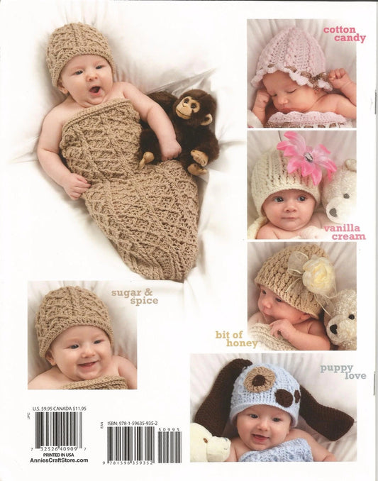 Baby in knitted hat and wrap with various color options displayed.