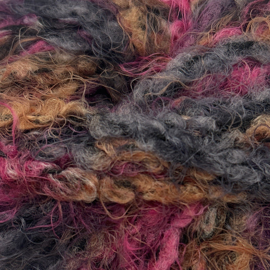 Multicolored skein of yarn on a white background