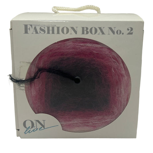 Fashion box with a purple ball and 'On Live' branding on a white background