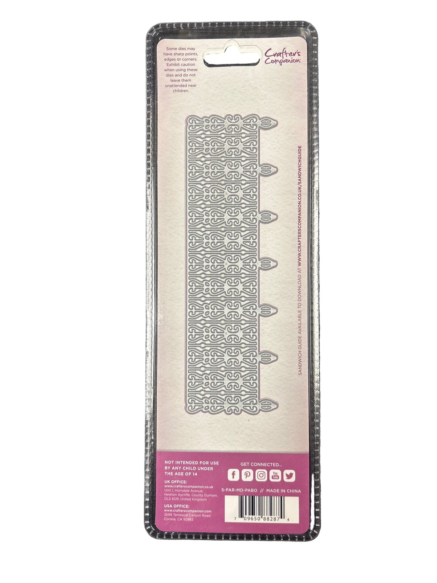 Clear plastic packaging with a patterned design on a dark surface