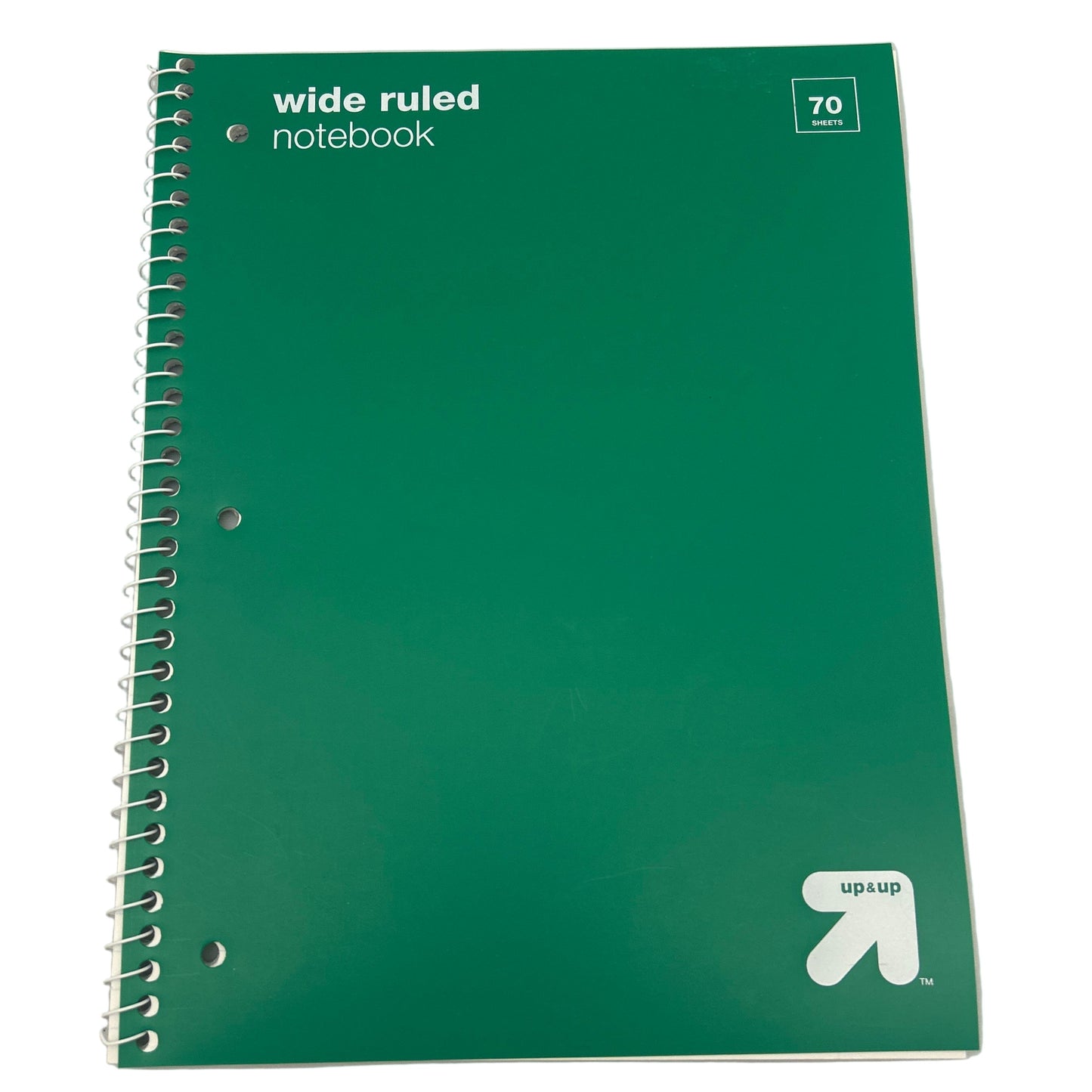 Green notebook with 'wide ruled' text and 'up & up' logo on a white background
