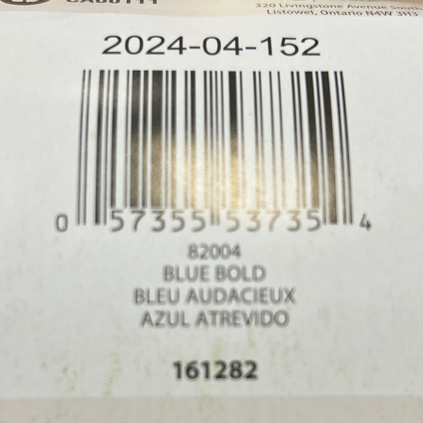 Close-up of a label with text and symbols on a product packaging.