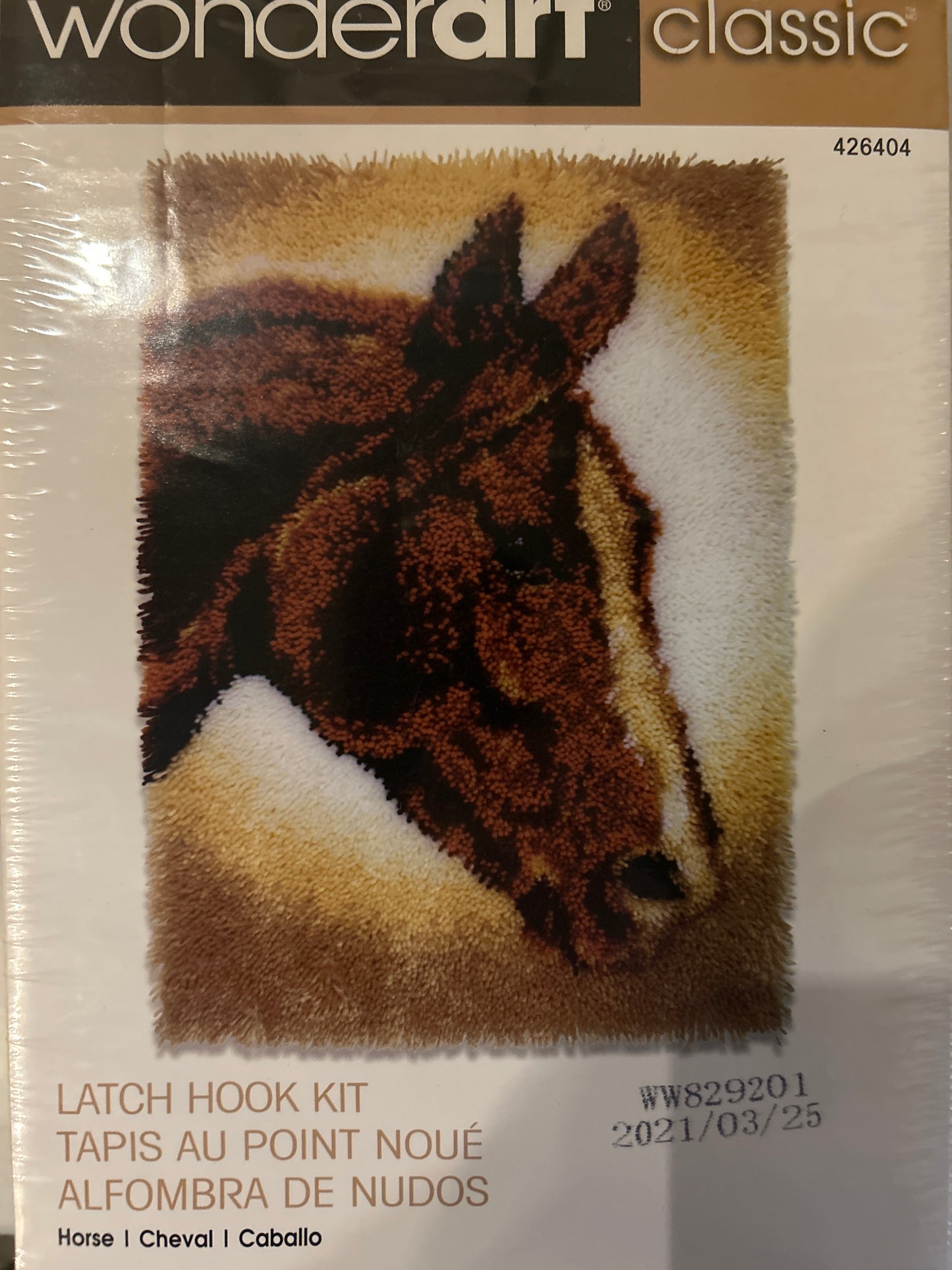 Latch hook kit with a horse design on a white background, featuring Wonderart branding.