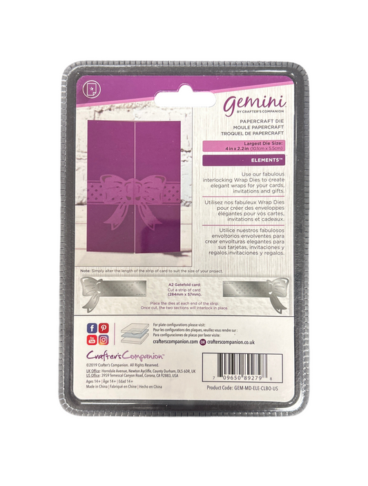 Package of Couture Creations Gemini paper craft with purple card and bow design.