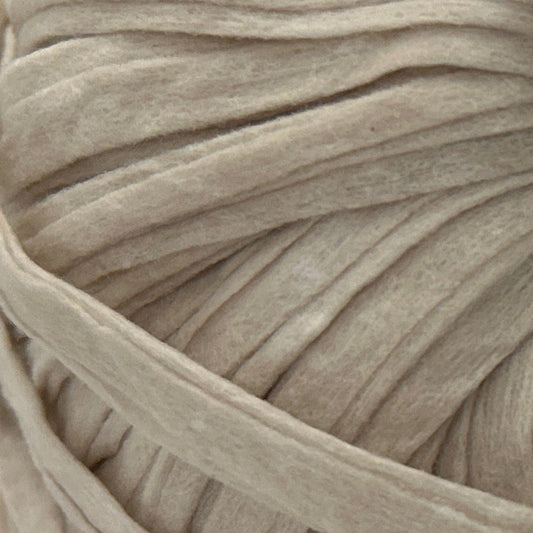Close-up of a ball of beige yarn