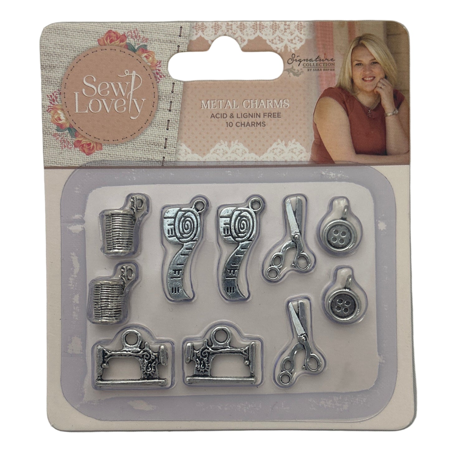 Set of metal stamps in packaging on a gray background