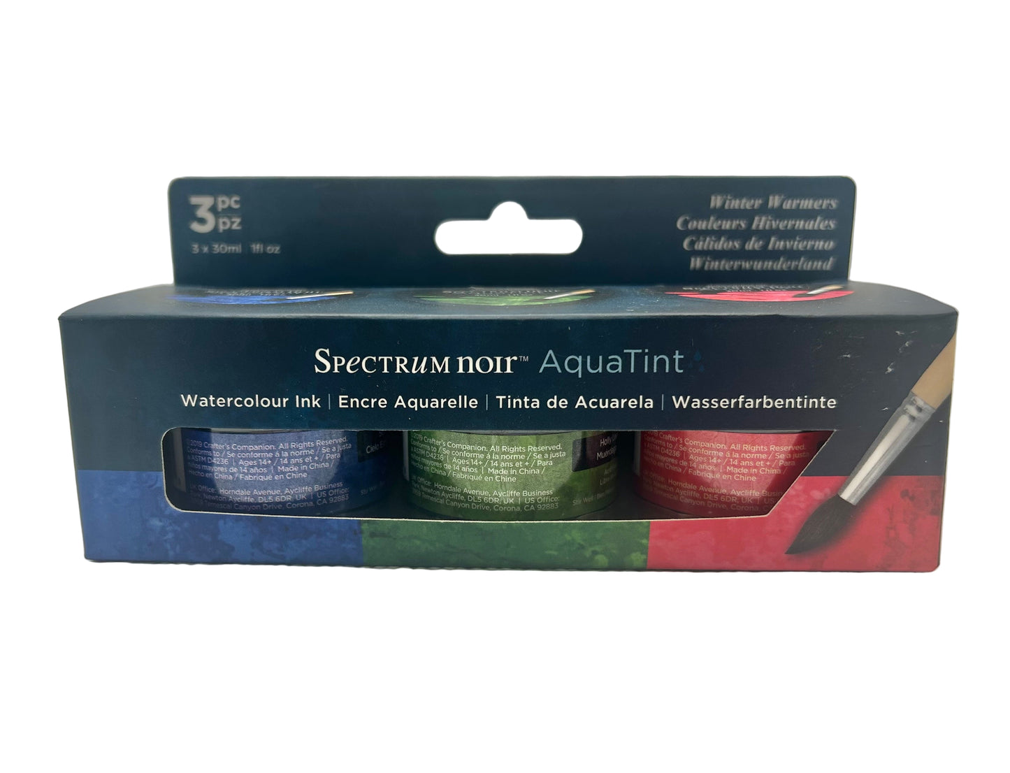Packaging of Spectrum Noir AquaTint watercolor ink set with three jars on a white background