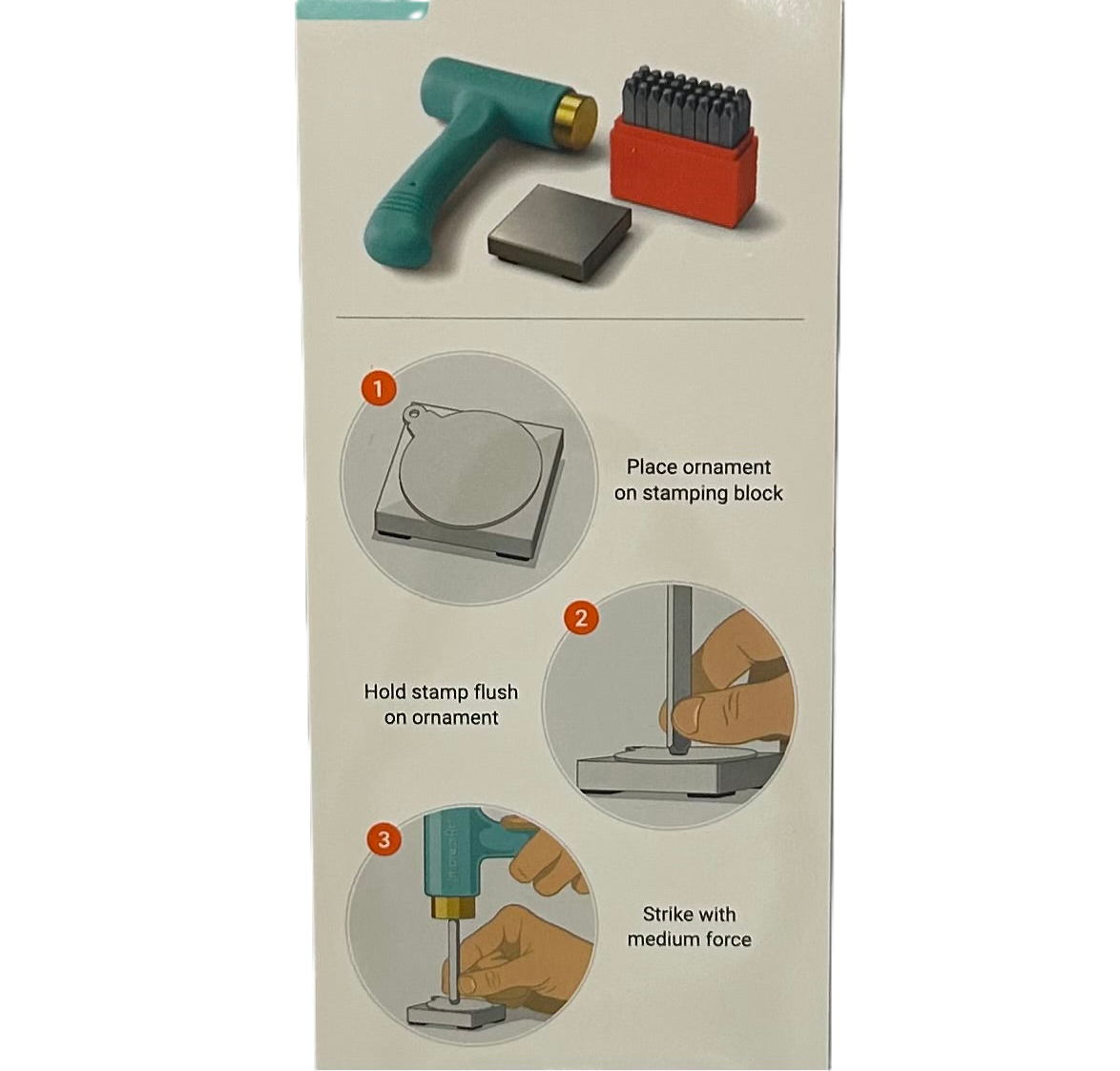 Packaging of a stamping tool set with tools and instructions on a beige background