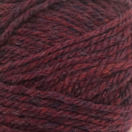 Close-up of a ball of dark red yarn