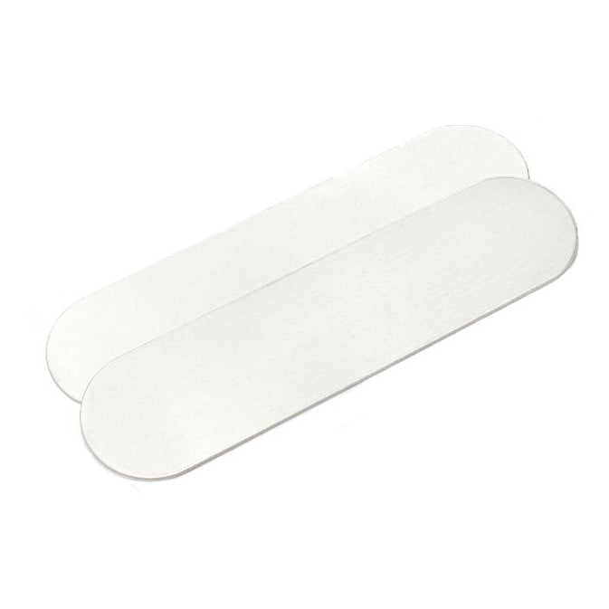 Set of metal bands and pliers on a white background