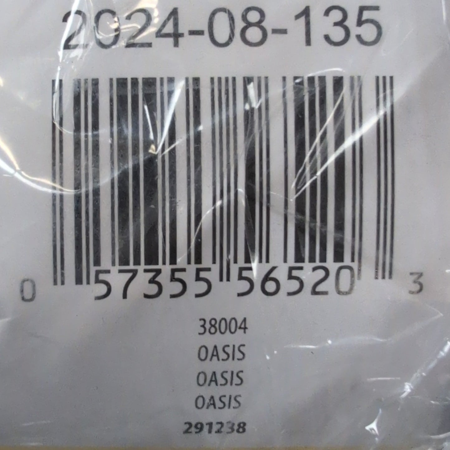 Product with a barcode label and text on a clear plastic bag.