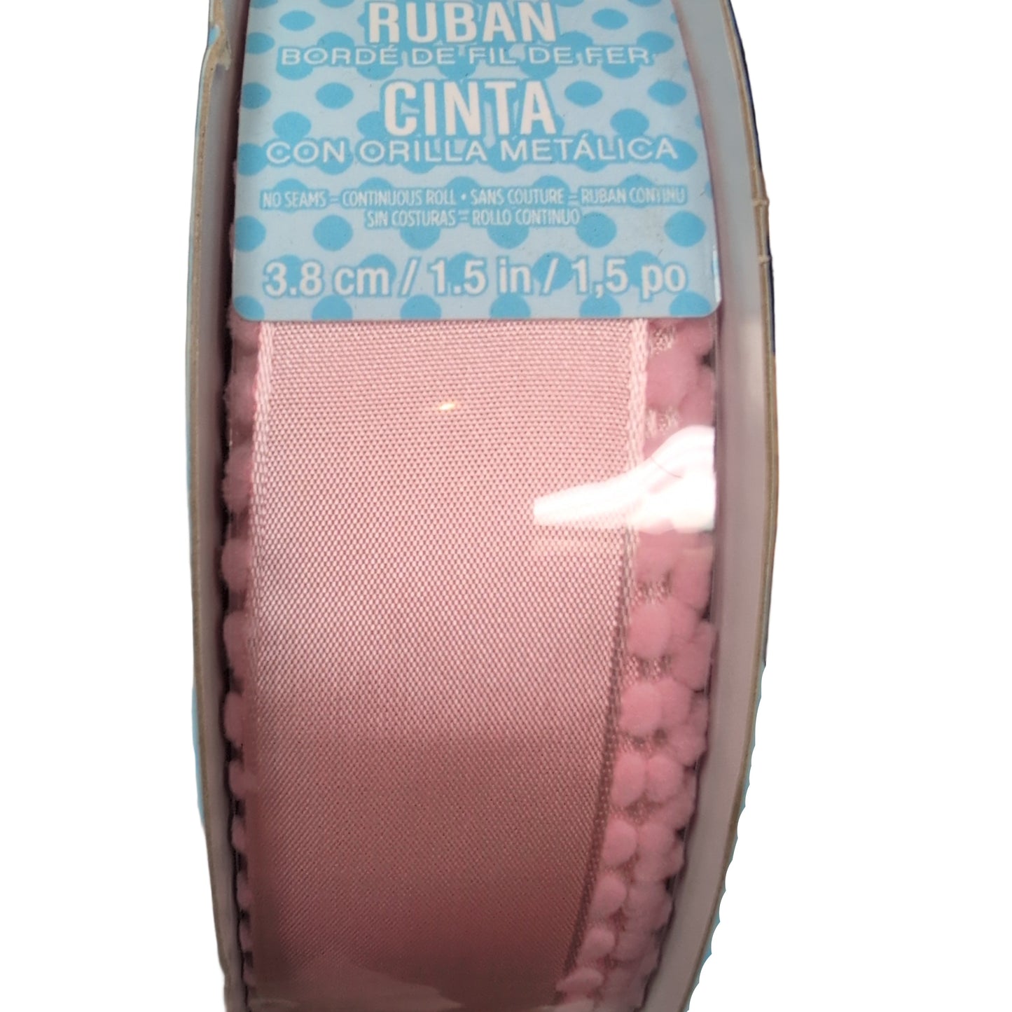 Spool of pink ribbon with blue label on a white background