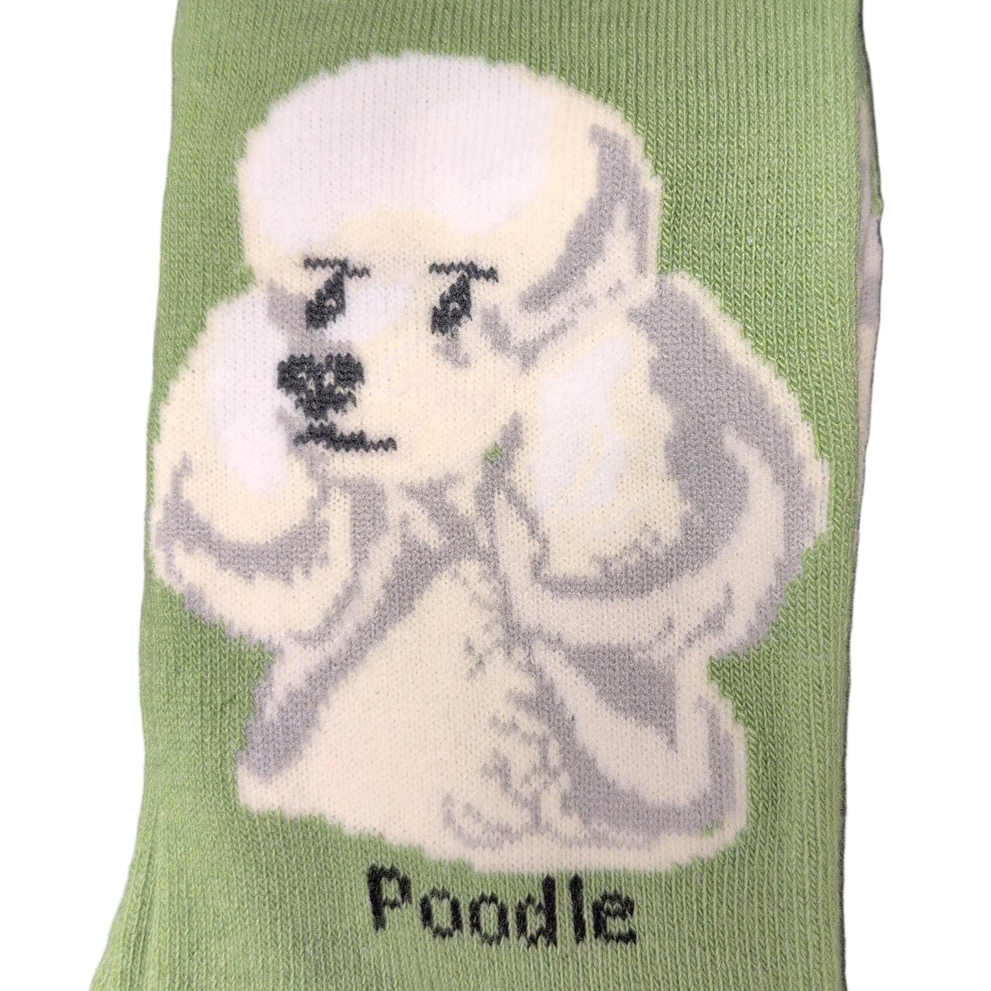 Green sock with a poodle design and the word 'Poodle' on a white background