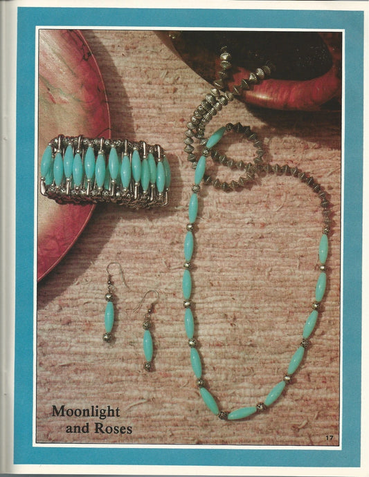 Turquoise beaded jewelry set with 'Moonlight and Roses' text on a textured surface.