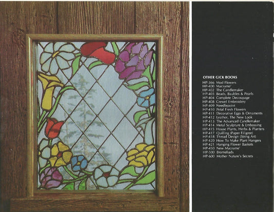 Stained glass panel with floral design on a wooden frame, next to a list of other craft books.