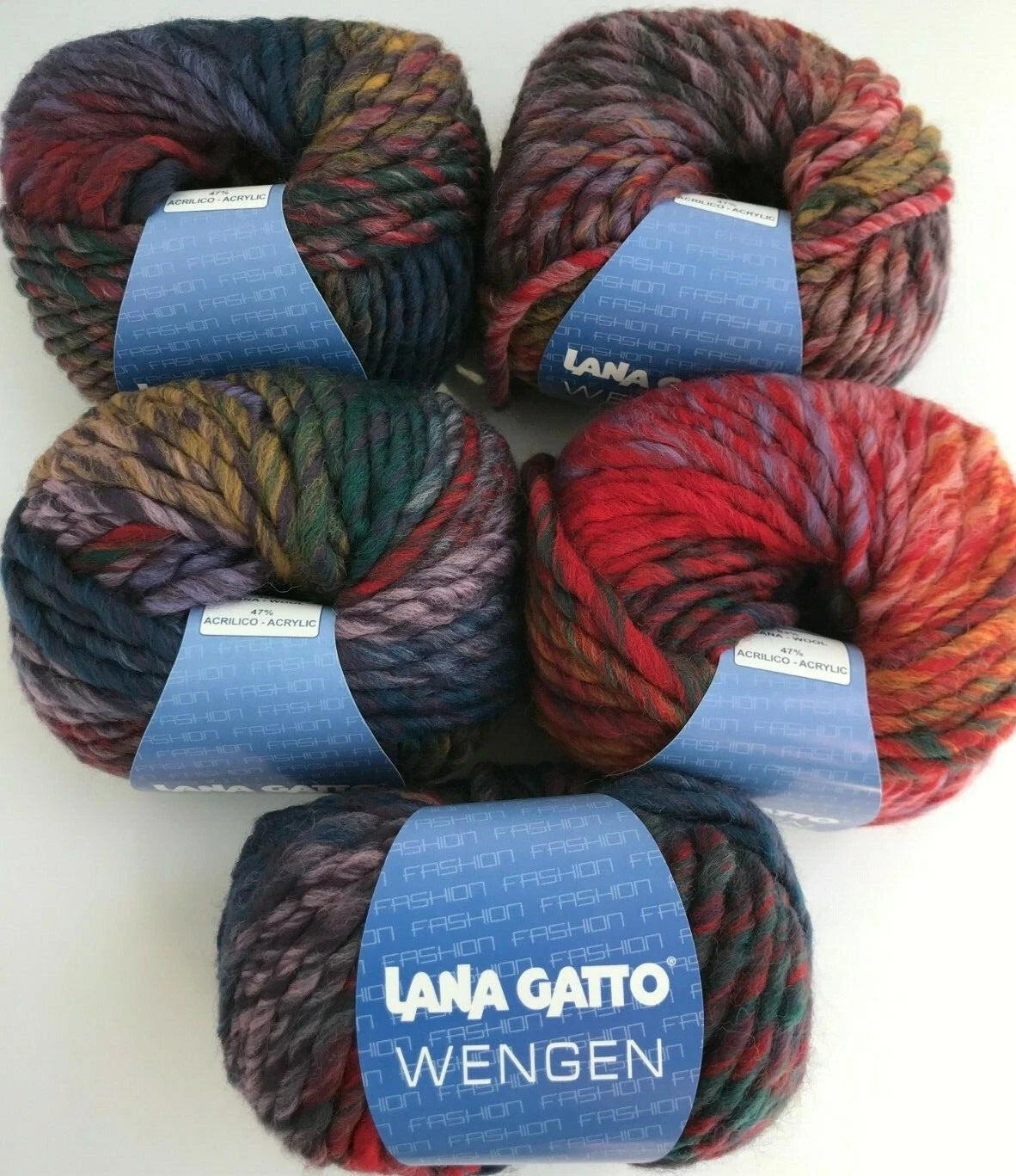 Five skeins of multicolored yarn with 'Lana Gatto' labels on a white background