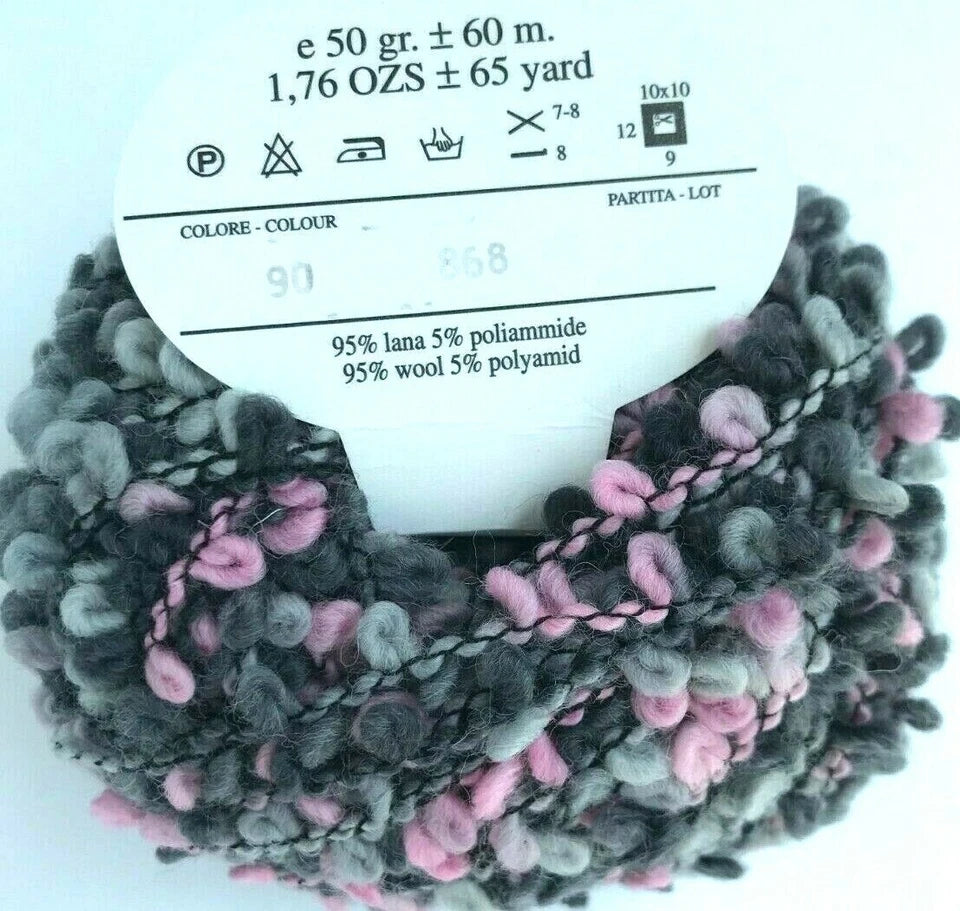 Yarn ball with pink and gray pattern and label on a white background
