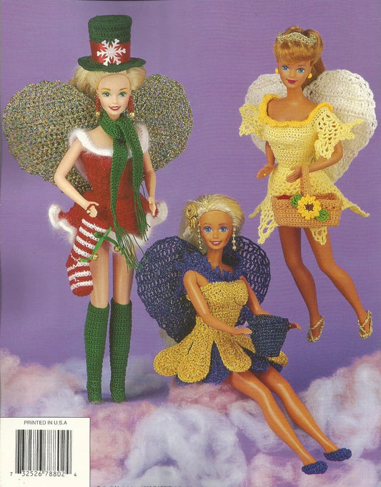 Three angelic dolls in colorful outfits on a purple background