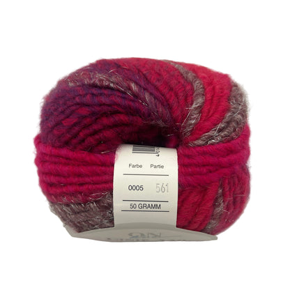 Red and brown skein of yarn with a label on a white background