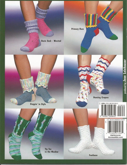Collection of various knitted socks displayed on a colorful background