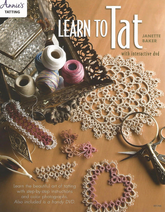 Book cover of 'Learn to Tat' with tatting supplies and lace on a wooden surface.