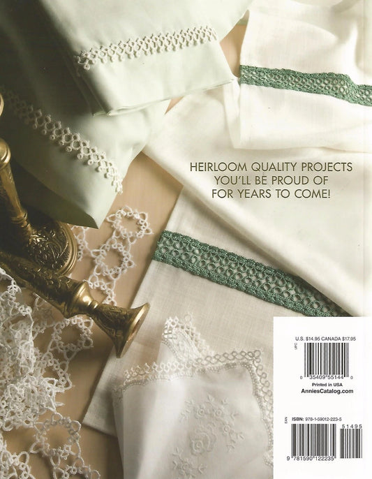 Textured fabric with lace details and a gold object on a white background, featuring text about heirloom quality projects.