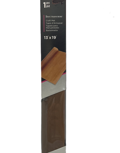 Packaged craft mat with brown surface and Spectramat branding on a white background