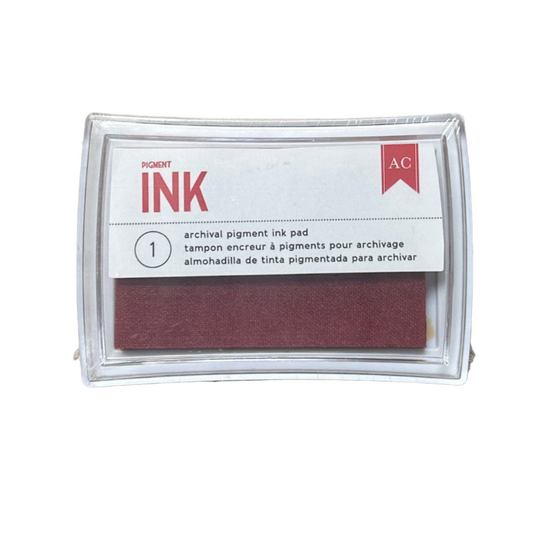 Archival pigment ink pad with a label on a white background