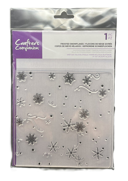 Packaged snowflake die set by Crafter's Companion with clear plastic cover.