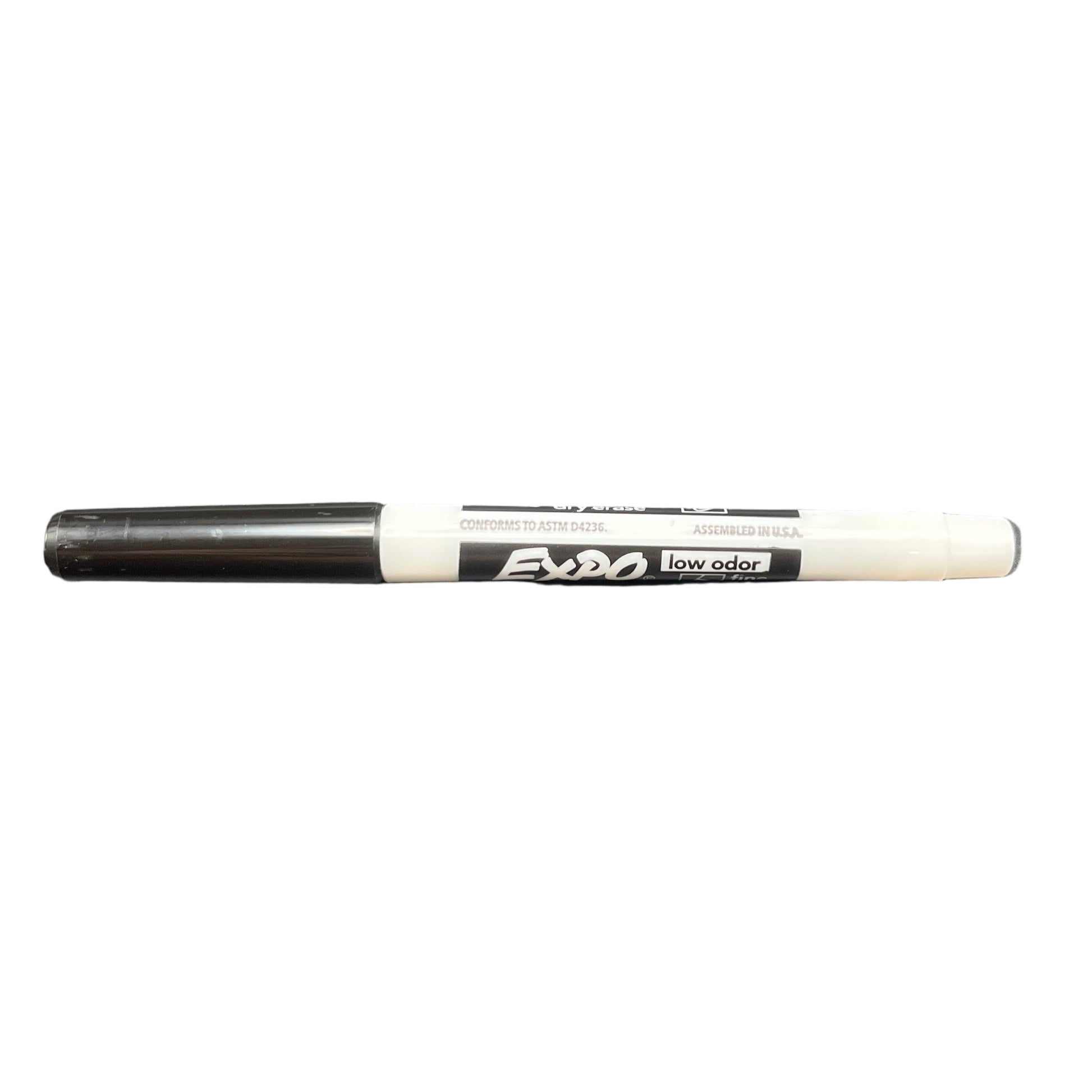 Black marker with white cap on a white background