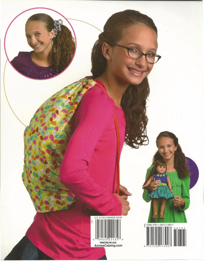 Backpack with colorful pattern worn by a girl, with inset images of a girl and a doll.