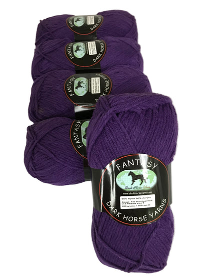 Purple yarn skeins with labels on a white background