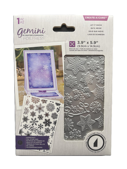 Packaging of Gemini foil press with snowflake designs and card on a white background