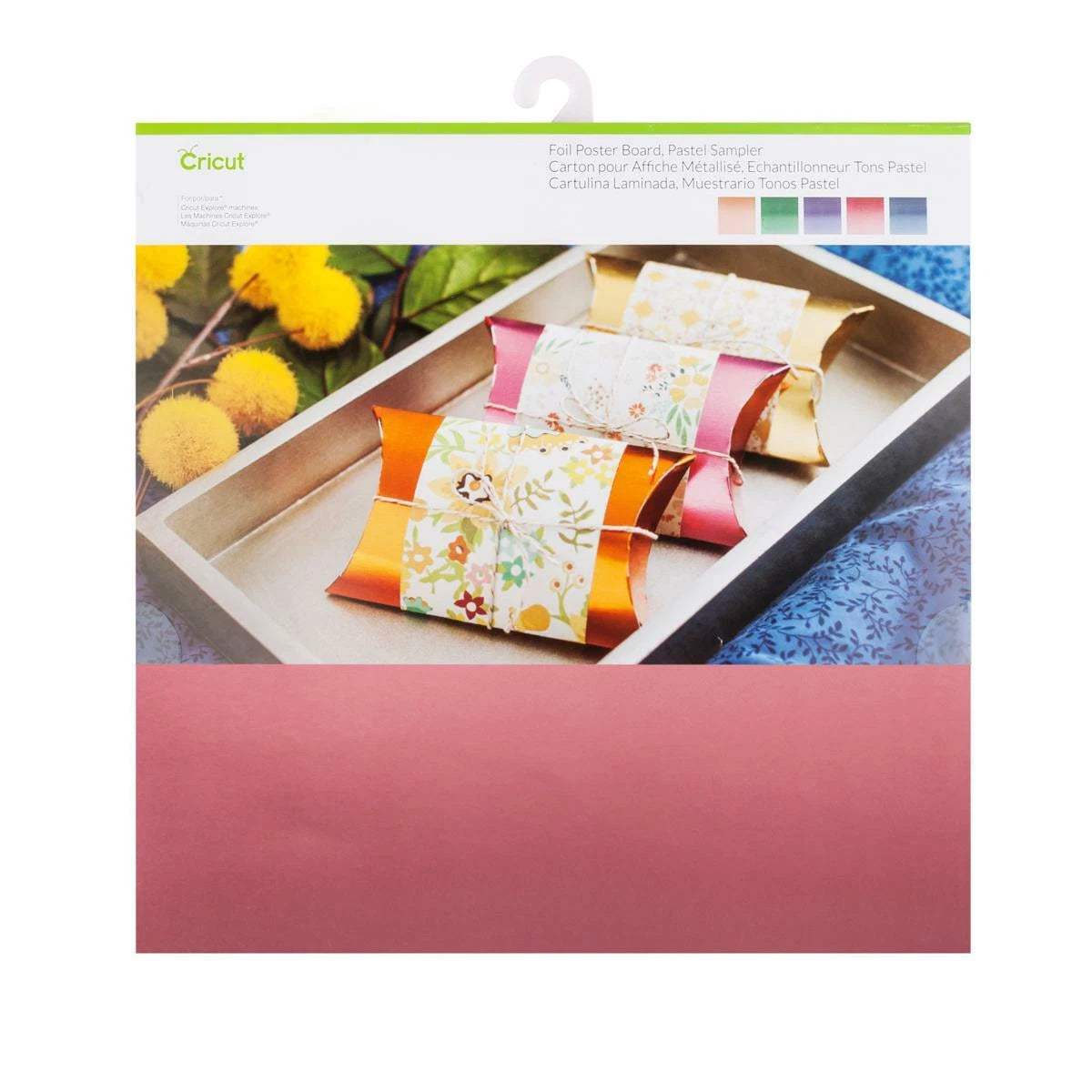 Cricut craft paper with decorative boxes on a tray, featuring a floral pattern.