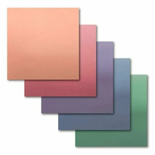 Set of metallic sheets in various colors on a white background