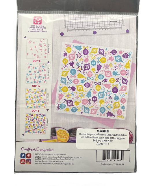 Packaging of a craft cutting machine with colorful designs on a white background